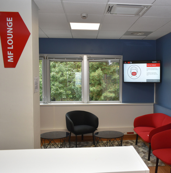 employee break area with digital signage from spinetiX